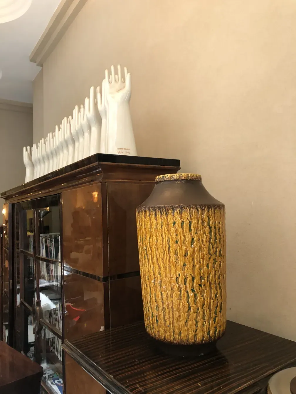 antique ceramic vase with textured yellow and brown design
