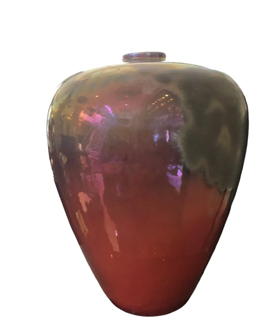 Antique ceramic jar with a gradient color