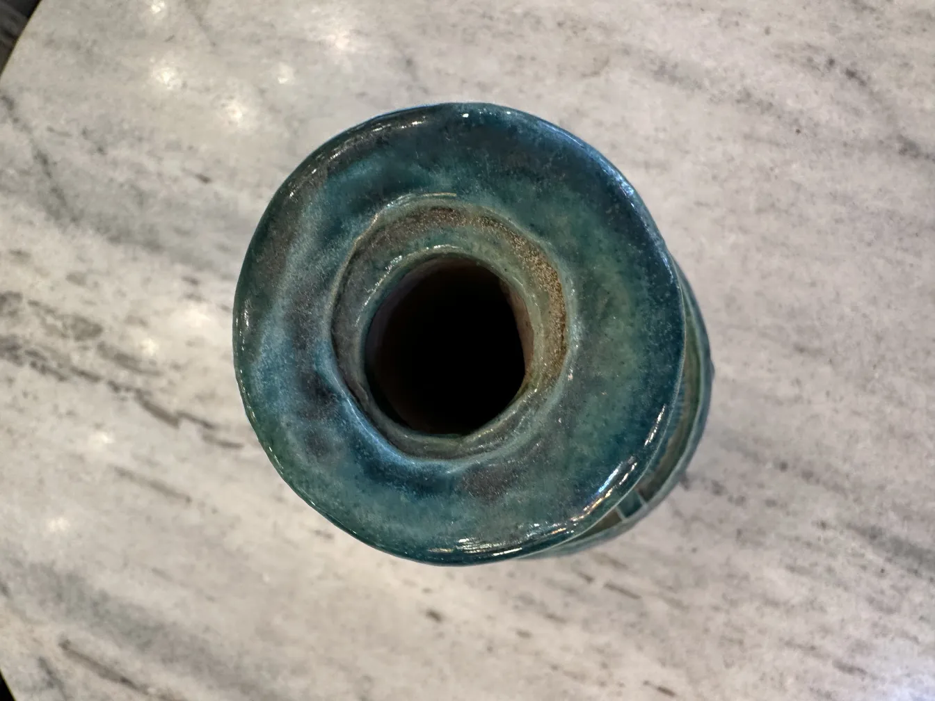 Ancient blue ceramic vase with intricate details