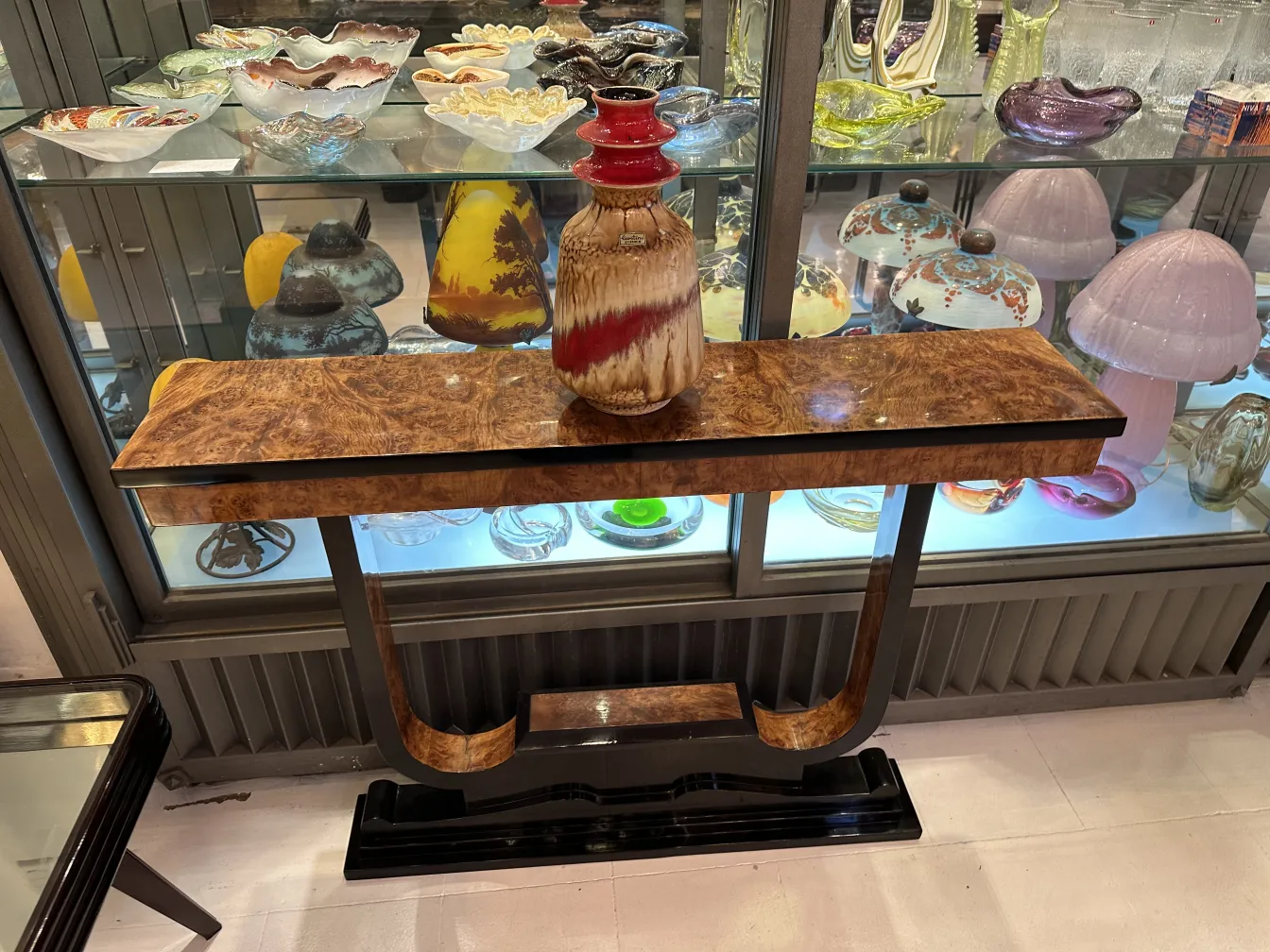 Antique ceramic vase with decorative pattern on table