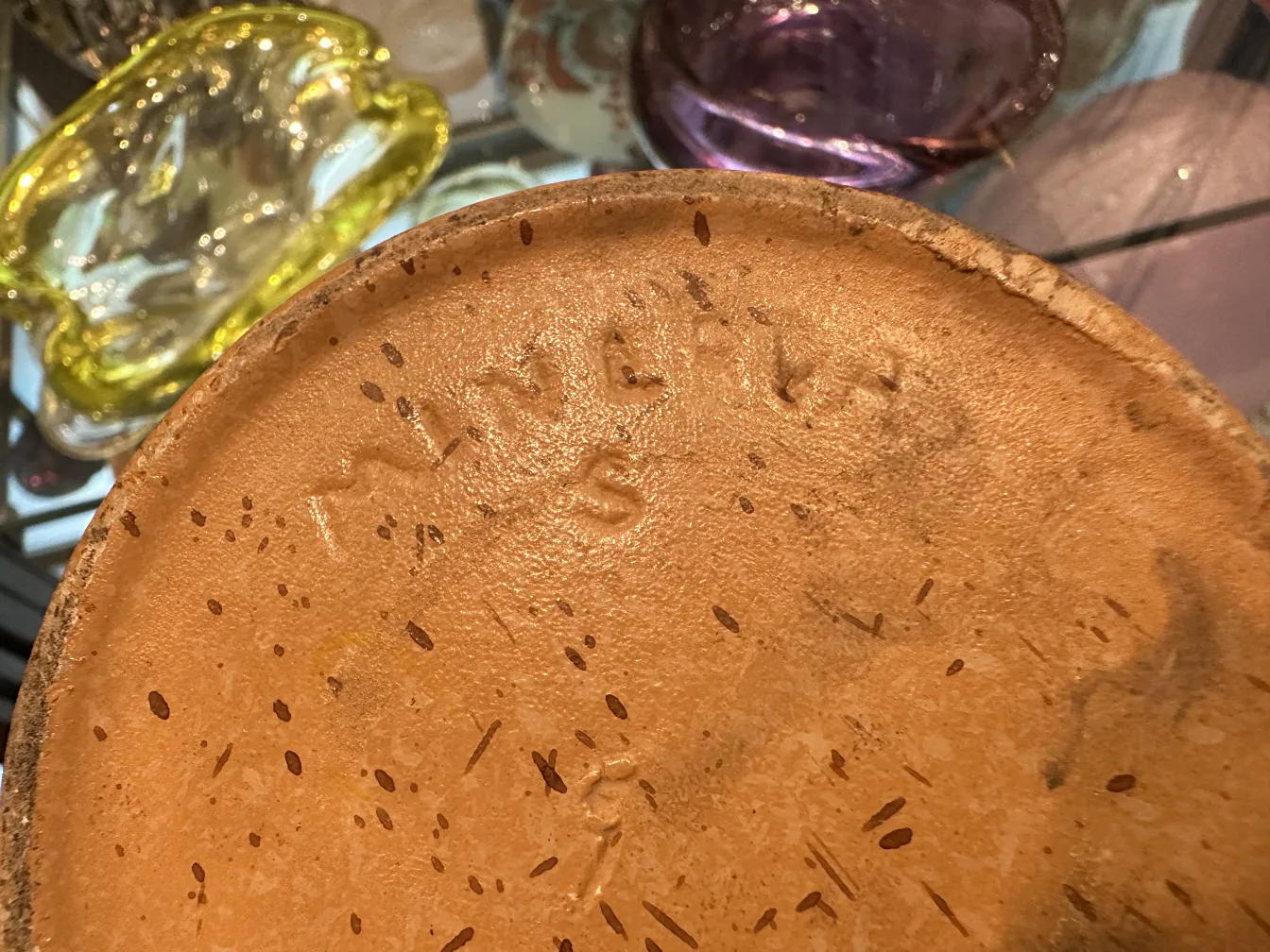 Base of antique ceramic with visible details and texture