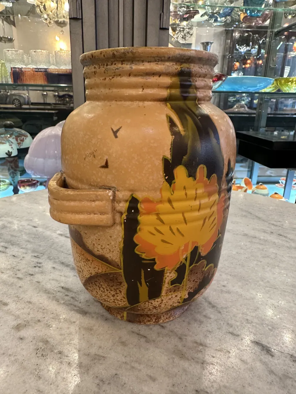 Antique jug with flowers and eye-catching design in England.