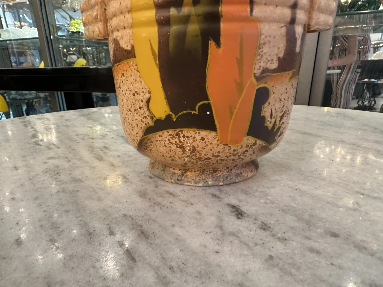 Antique decorative ceramic with vibrant colors on a table