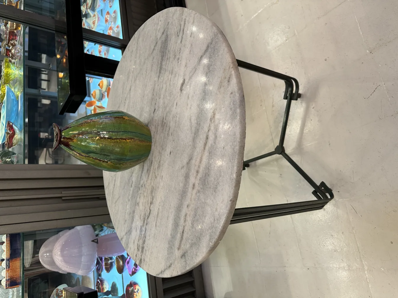 Stunning antique ceramic with artistic design in green hues.