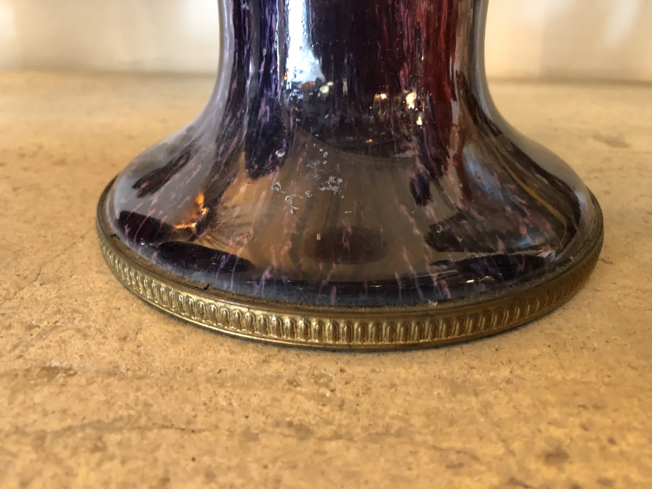 Antique ceramic base with decorative details and shine