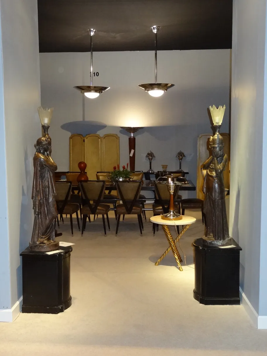 antique sculpture in an elegant setting with lamps