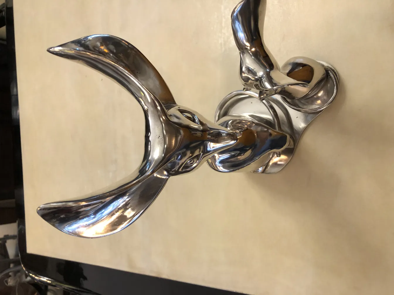 Ancient sculpture featuring elegant shapes and smooth curves.