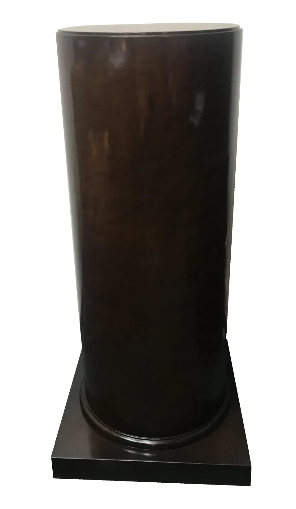 Antique decorative column with square base, brown color.