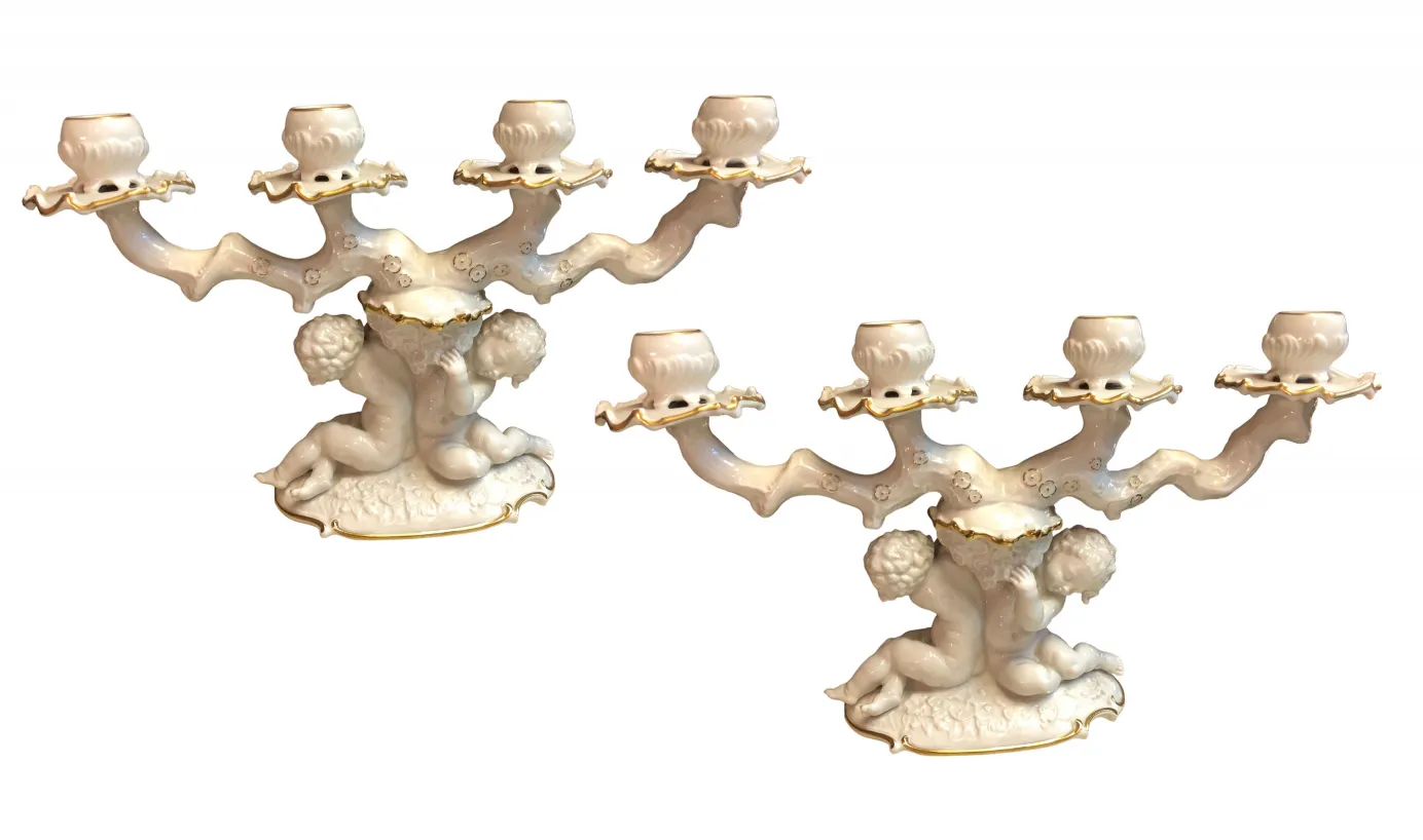 Antique white ceramic candelabra with golden details