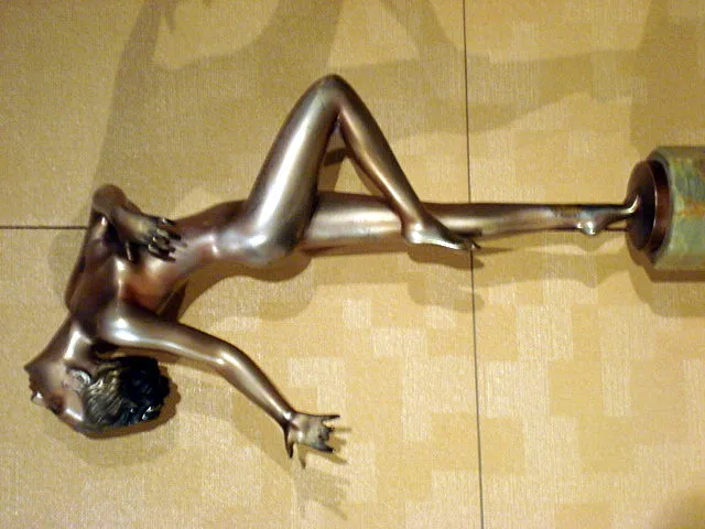 antique sculpture in elegant form displayed in room