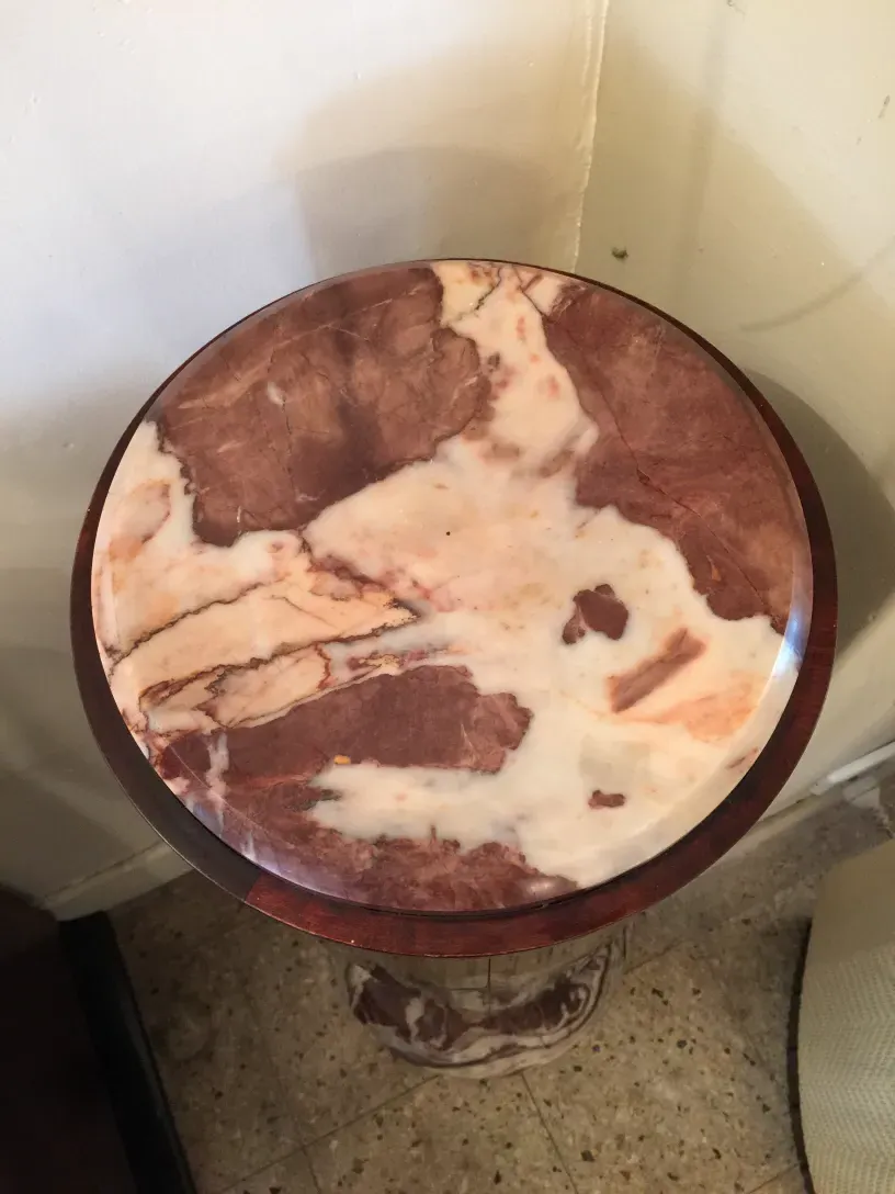 top view of an elegant antique column with brown and white details