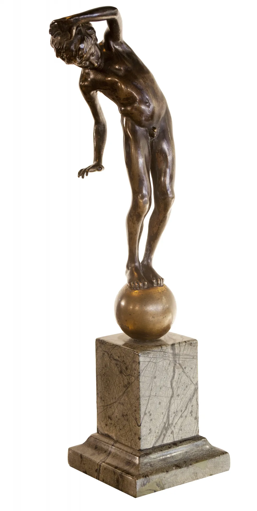 antique sculpture of male figure on golden sphere