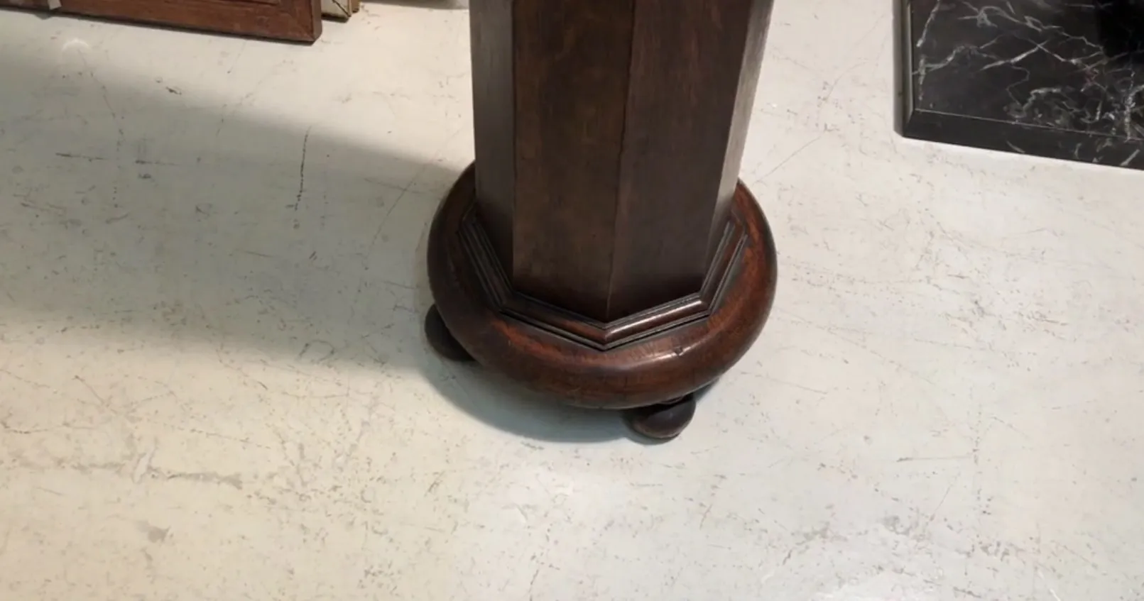 antique column with a round decorative base