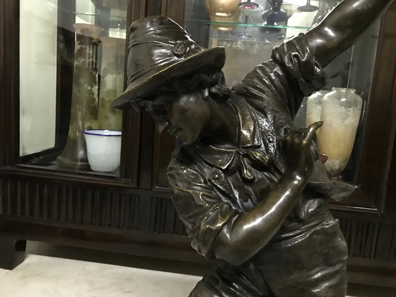 antique sculpture in action with an elegant background