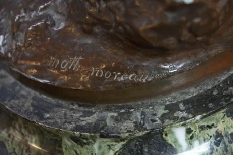 antique sculpture by Mathurin Moreau on a decorative base