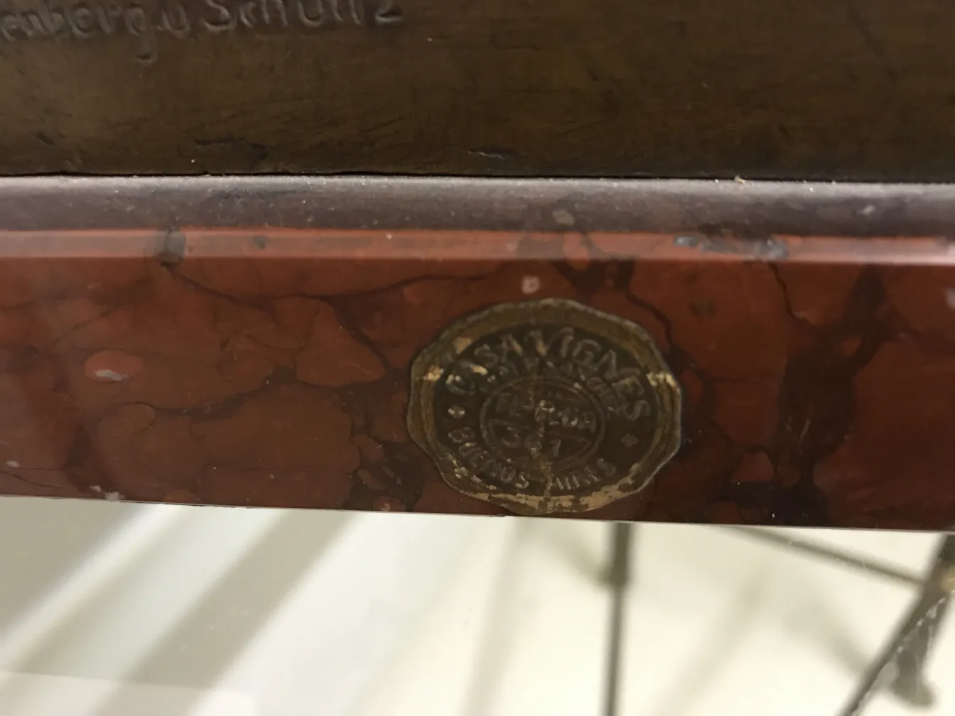 Antique sculpture with design details and classic ambiance, Guss Wollenberg Schuttz.