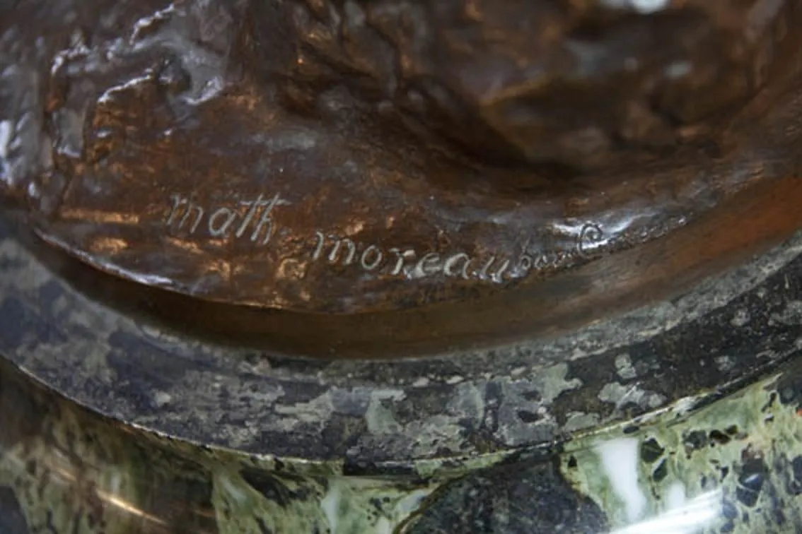 antique bronze sculpture with artisanal details