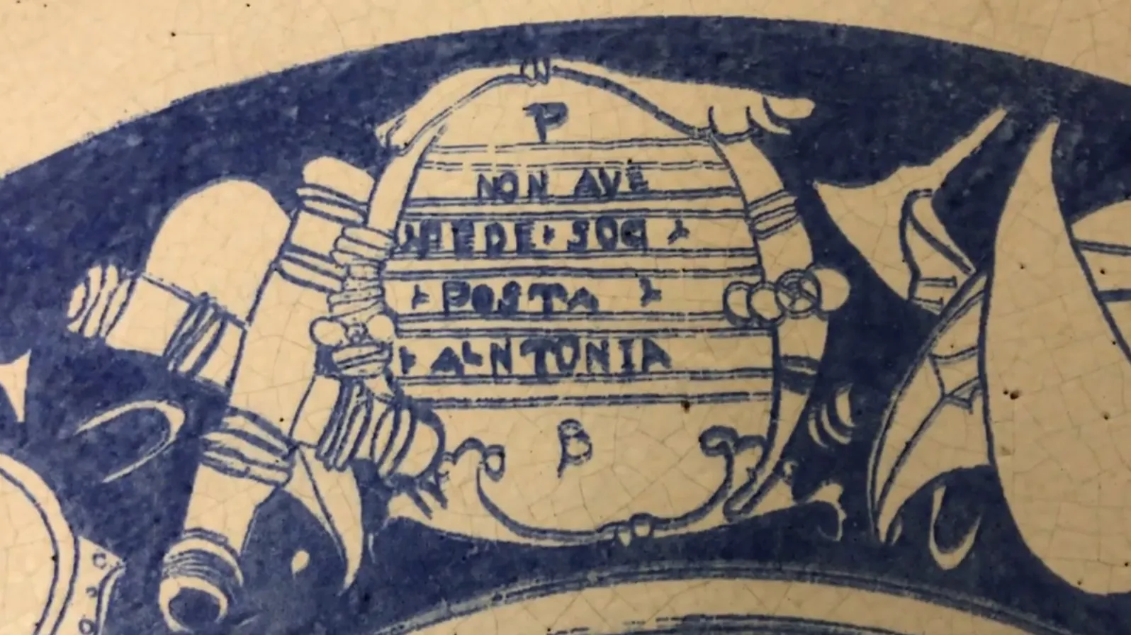 Antique ceramic with handcrafted blue and white design, decorative.