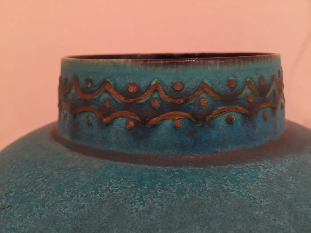 Decorative antique ceramic in blue tones with patterns