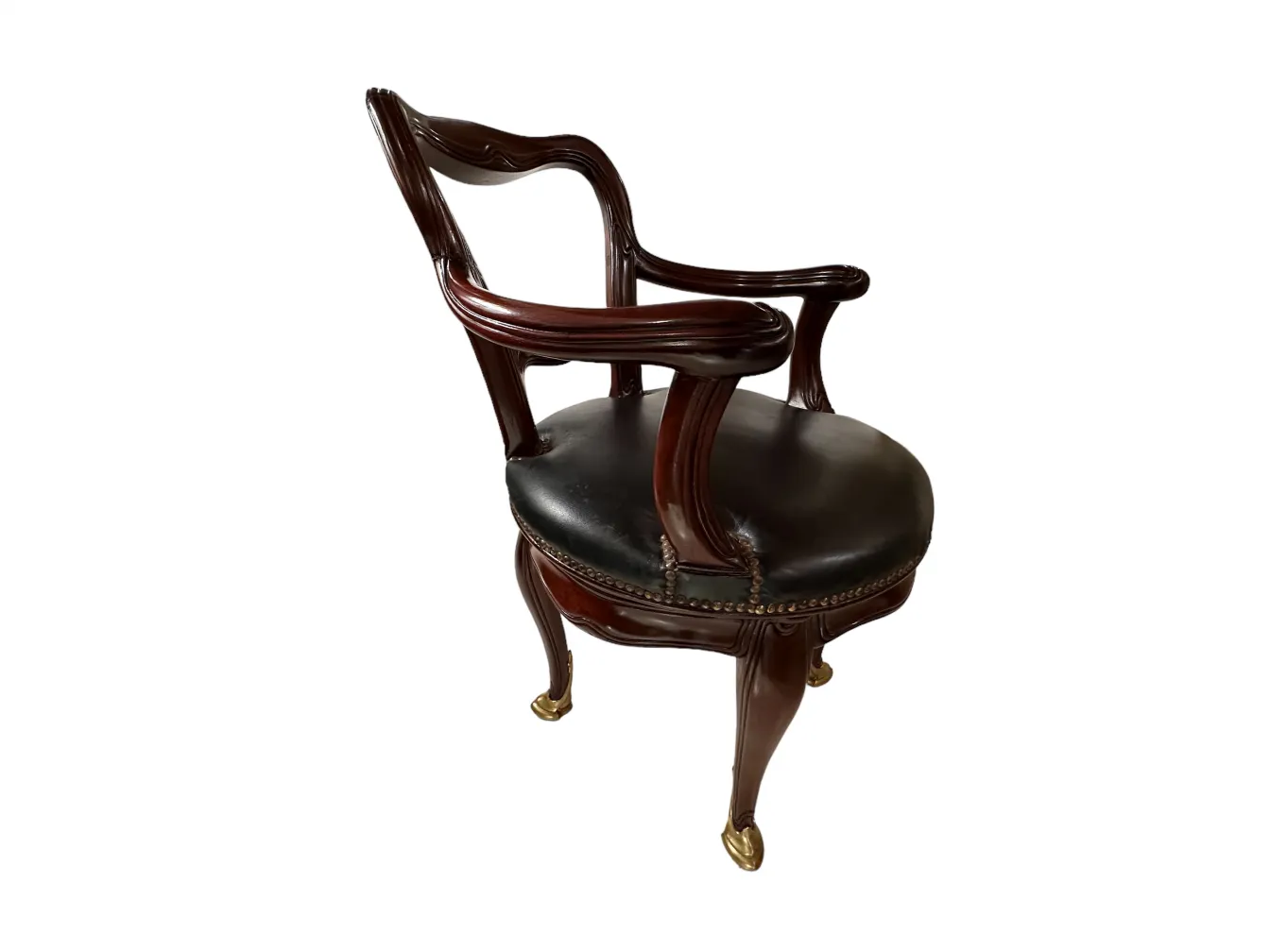 Classic dark wood chair with black seat in an elegant setting.