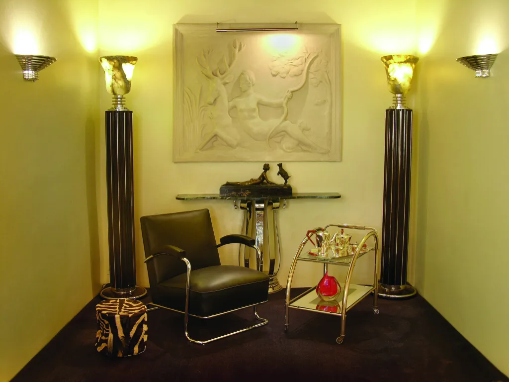 antique sculpture by joseph d'aste in an elegant setting