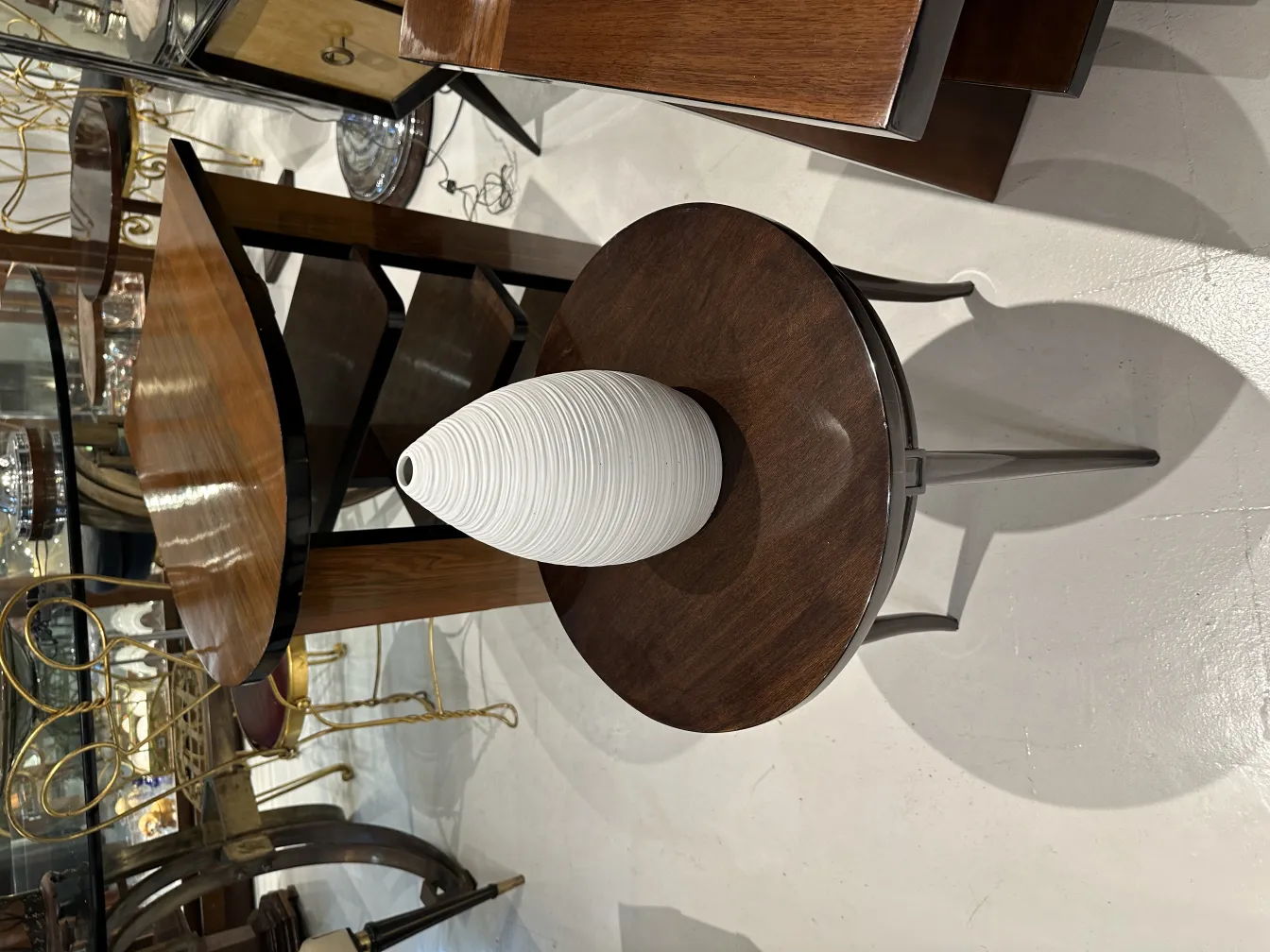 antique ceramic cone-shaped decor on round table