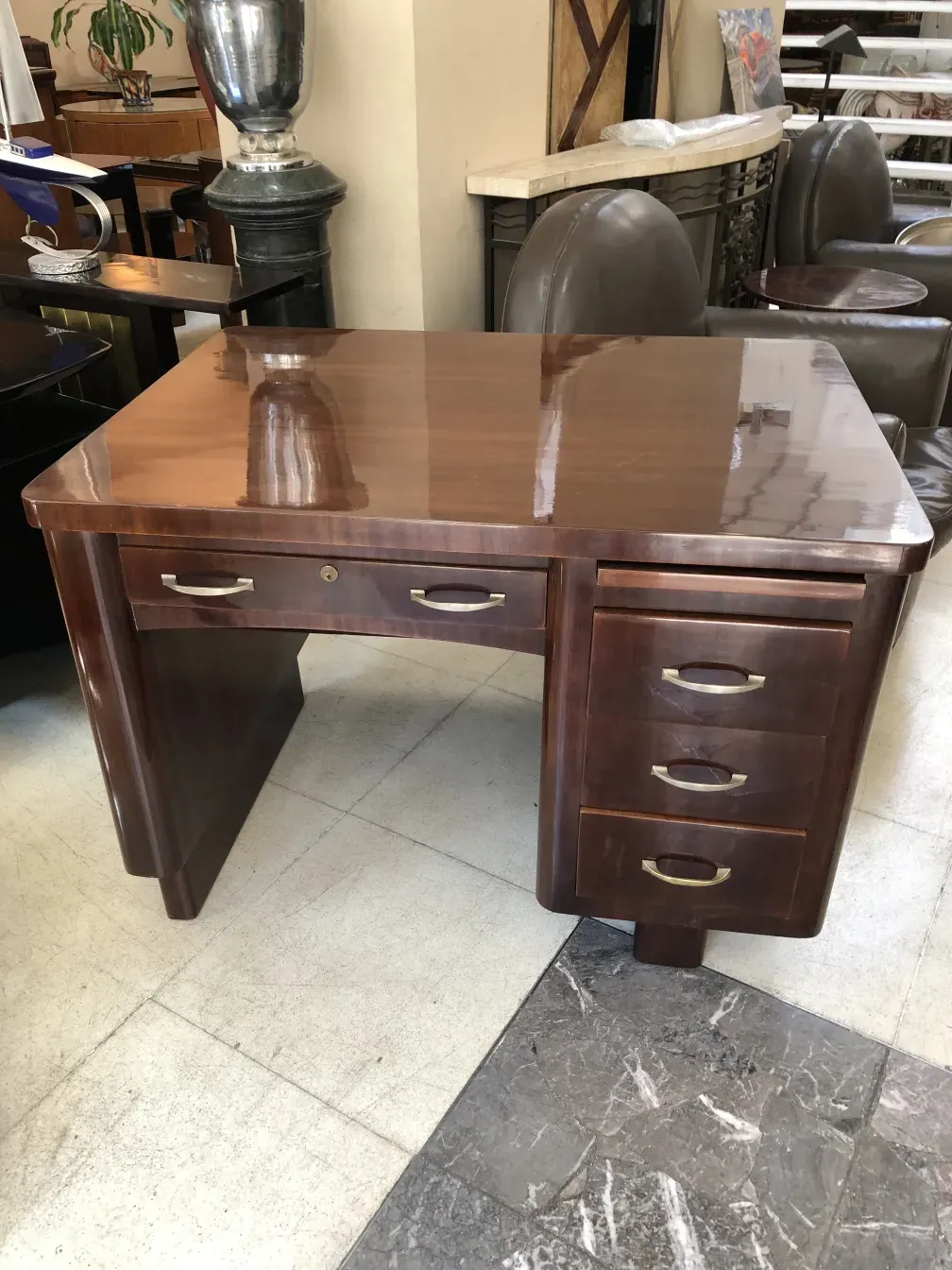 antique desk in vintage setting with drawers