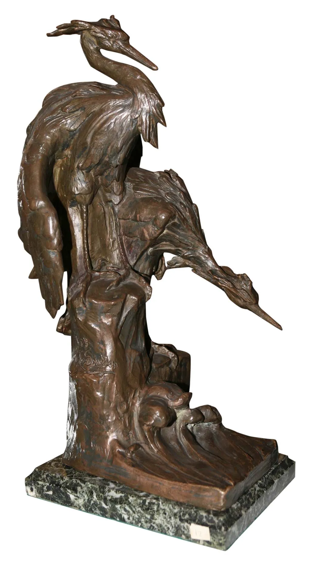 escultura antiga de aves com base decorativa