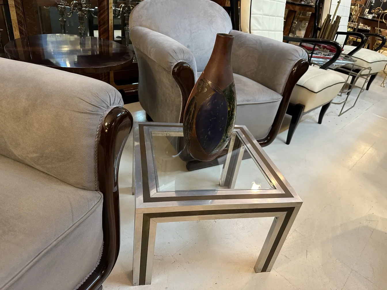 Antique decorative ceramic with unique design in dark color.