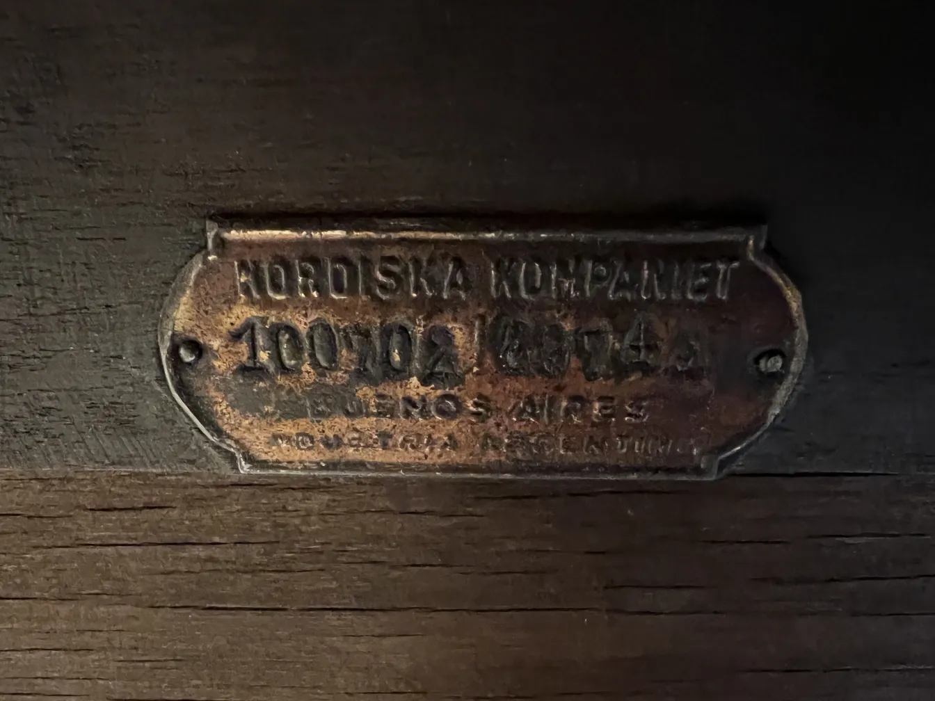 identification plate of an antique nordiska kompaniet desk.