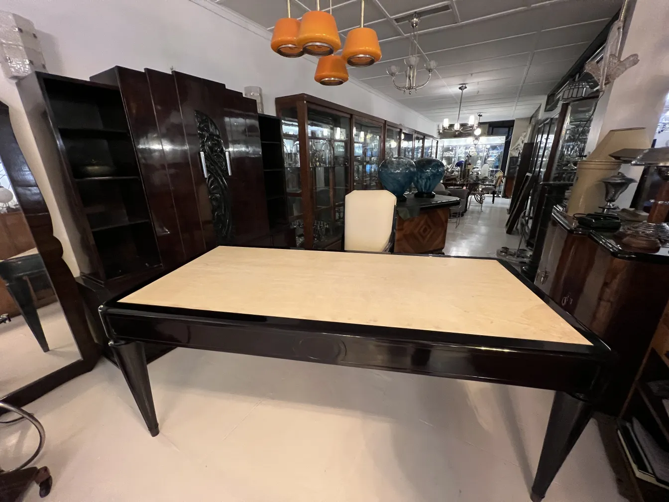 antique desk with a light surface in a shop