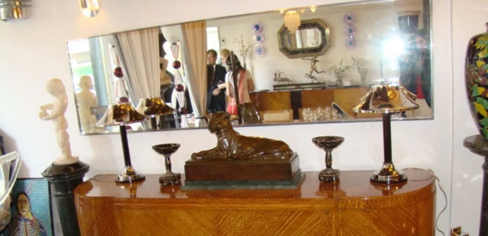 antique sculpture with elegant and delicate form, sophisticated setting