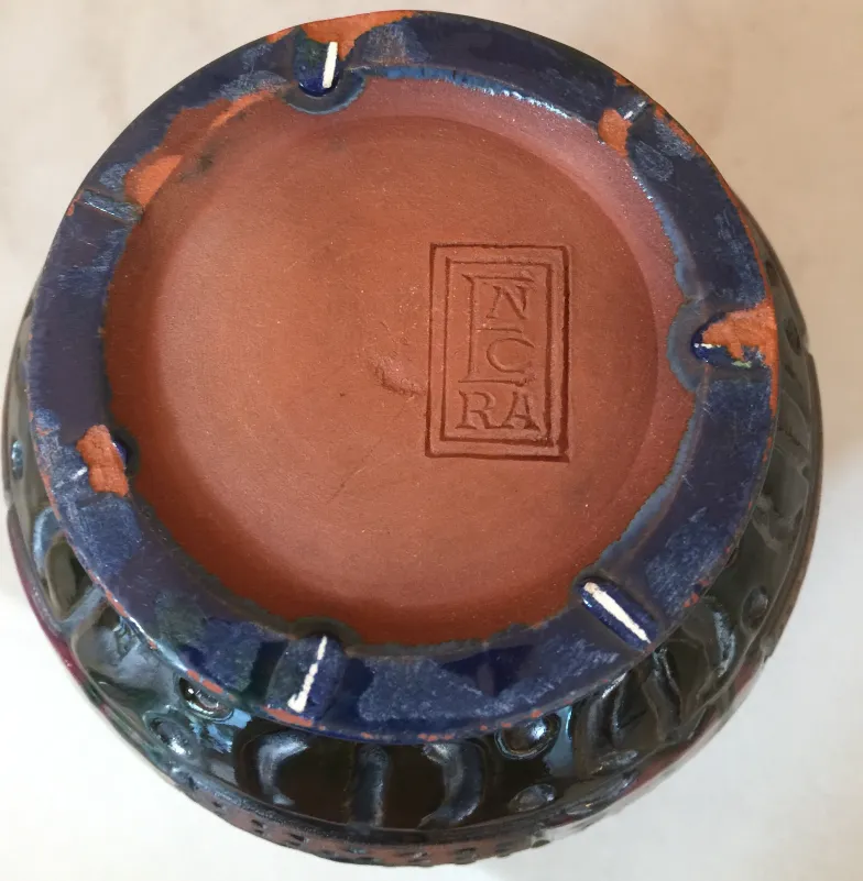 View of the bottom of an antique ceramic with seal