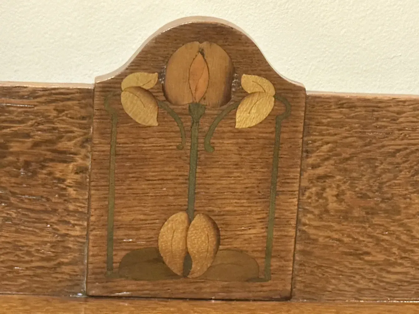 antique desk with floral and leaf decorations