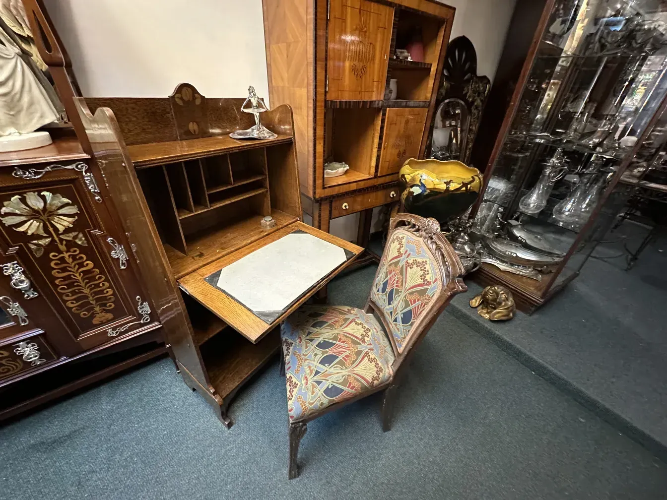 antique desk with detailed decoration in a classic setting