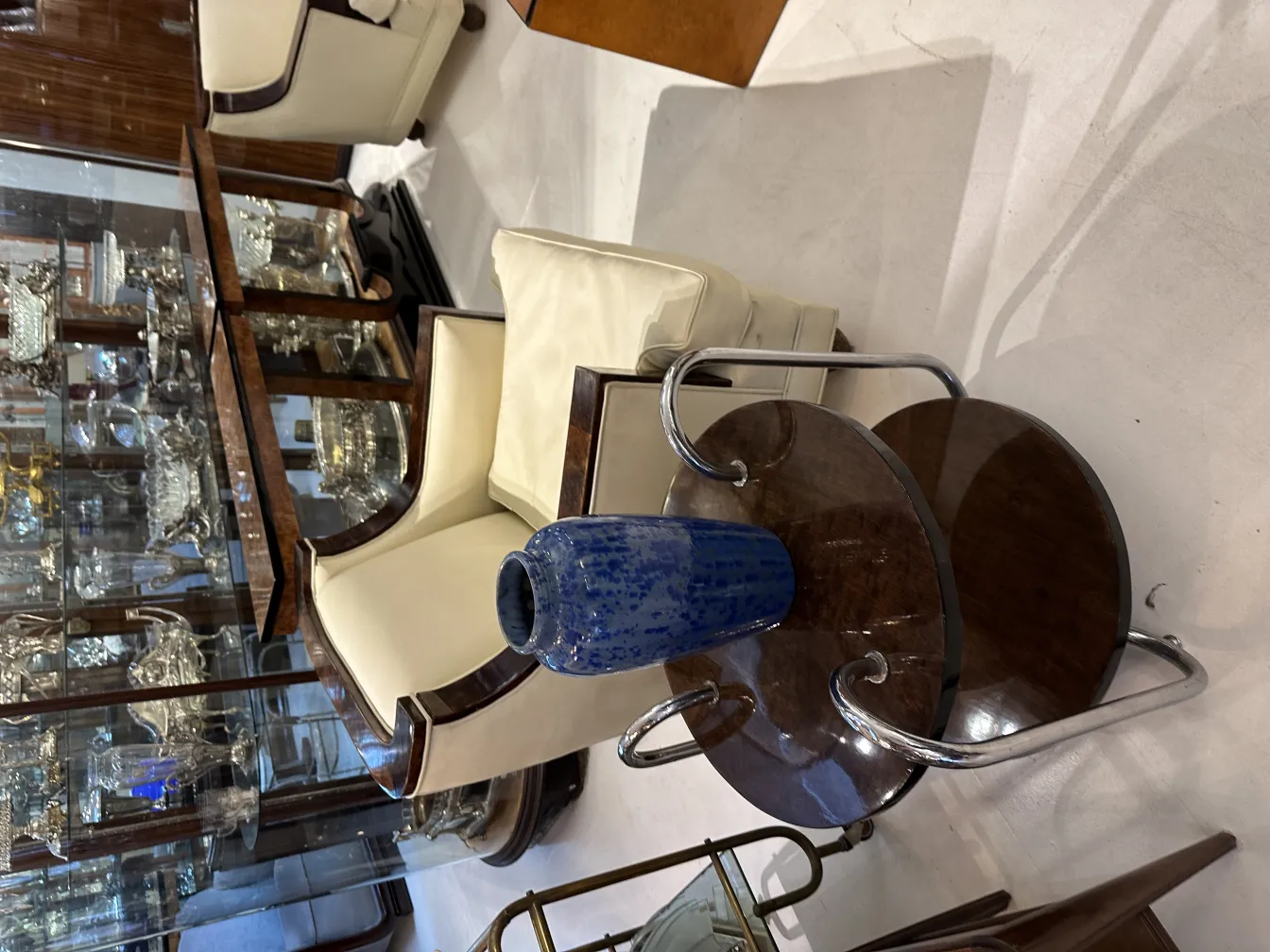 antique ceramic in the shape of a blue vase, with an elegant setting