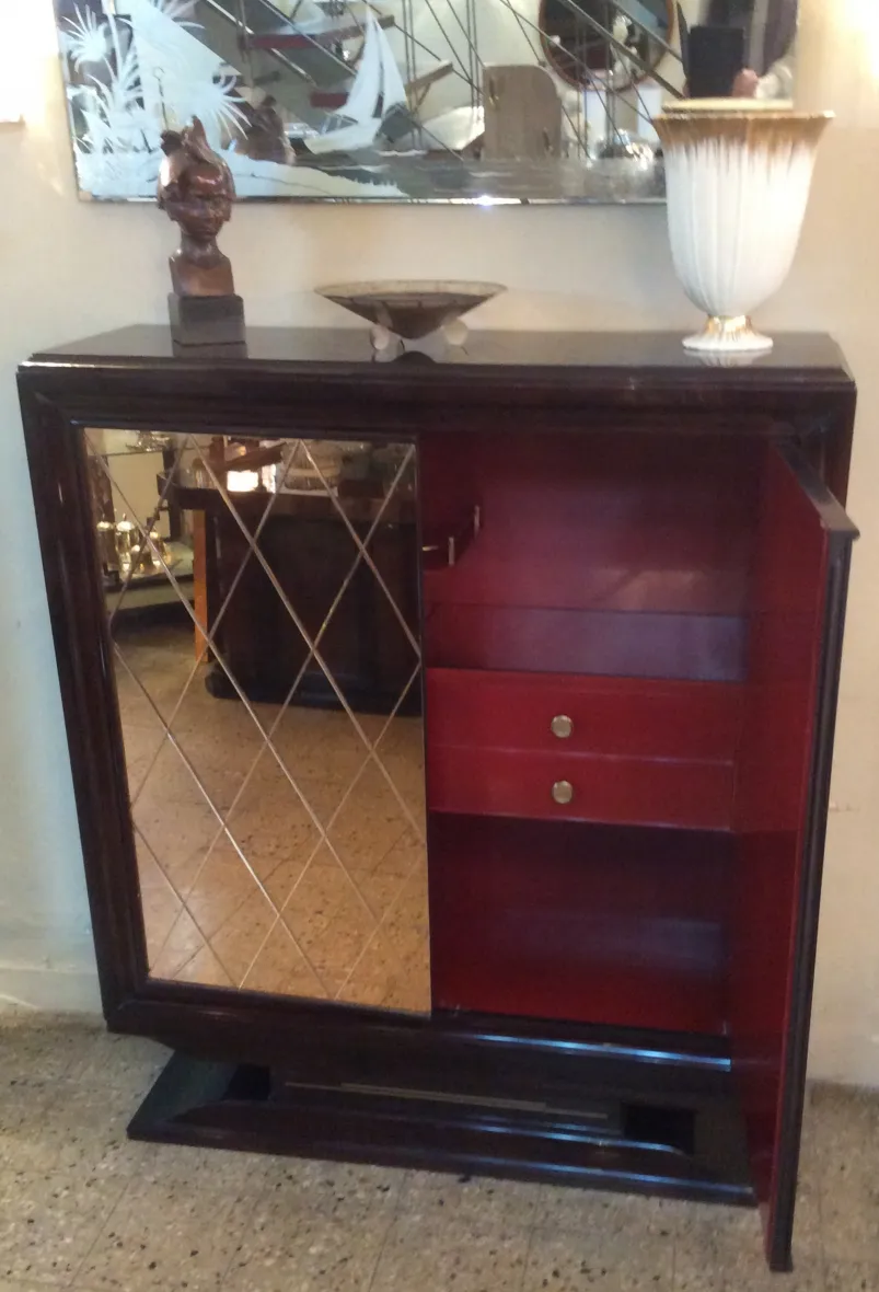 detailed antique sculpture in an elegant room with a mirror