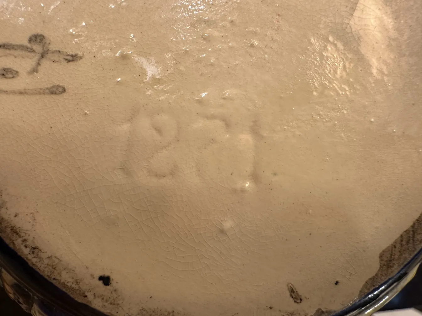 Detail of antique ceramic with inscription and texture