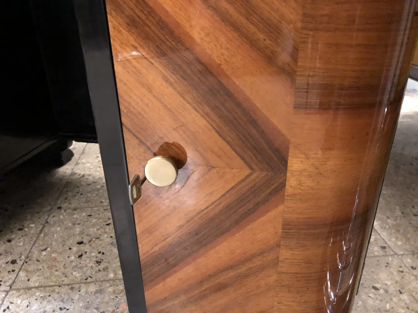 antique desk with buttons and wood details