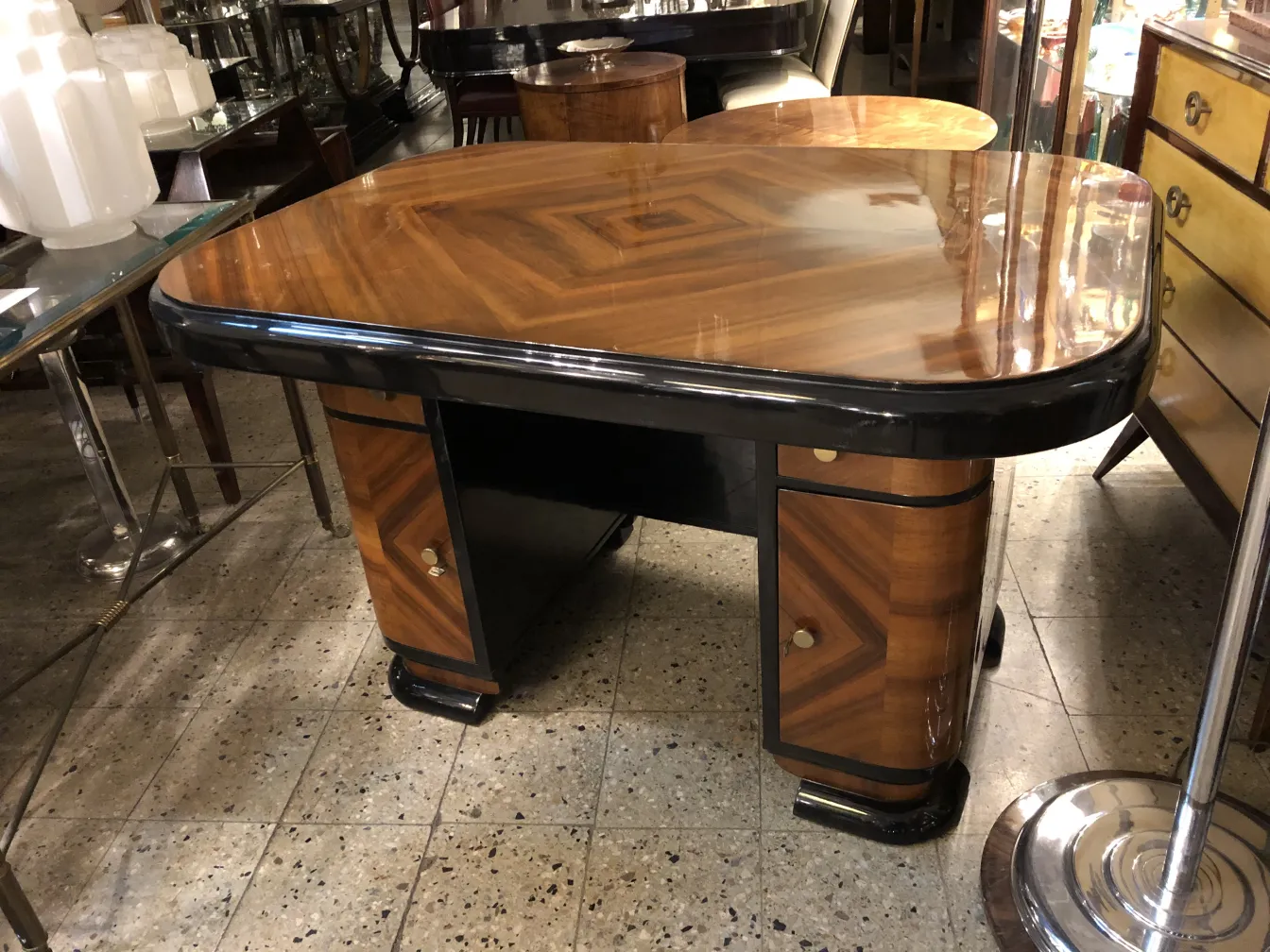 antique desk with a shiny surface and decorative details