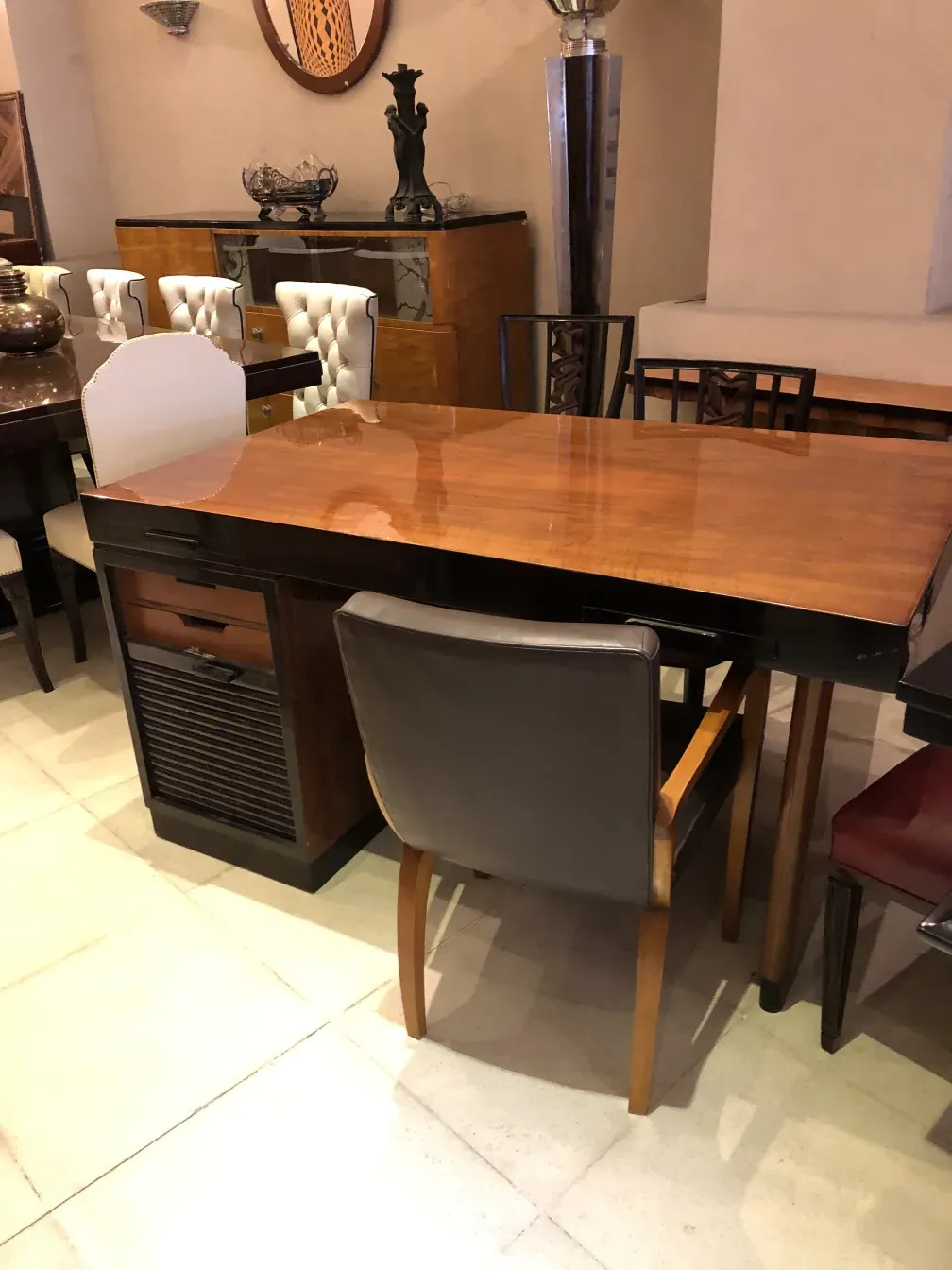 antique desk with chairs in a stylish setting