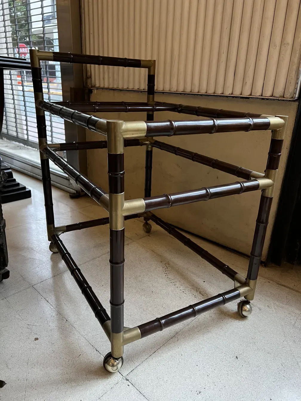 antique cocktail trolley Billy Haines with wheels in a subtle setting