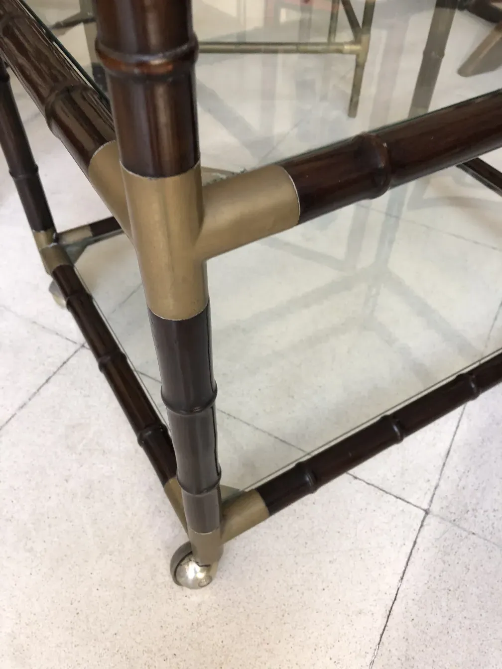 Antique cocktail trolley with a bamboo design, elegant style.