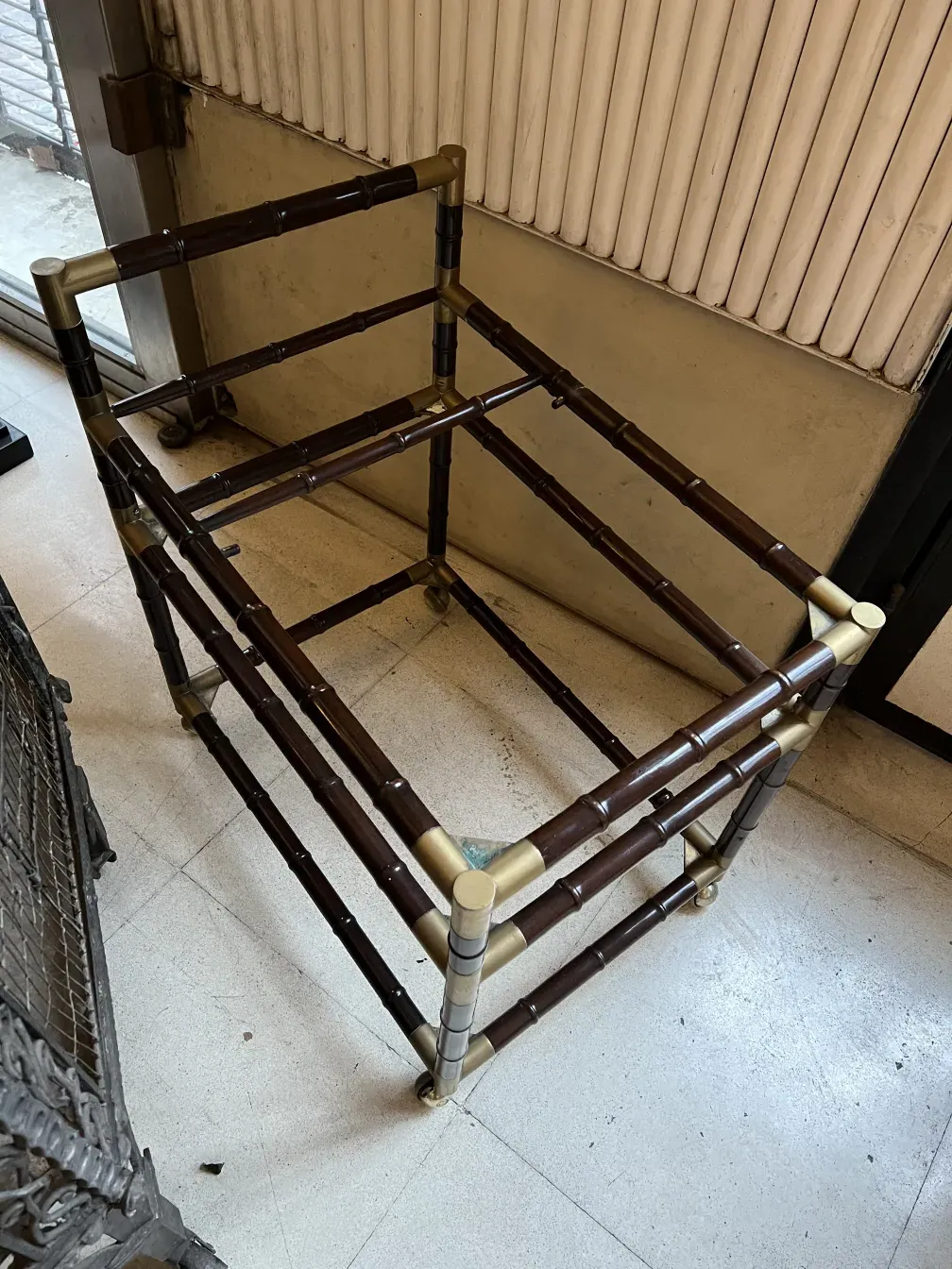 Antique cocktail trolley with stylish design.