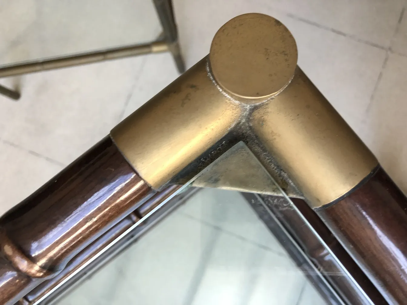 close-up of an antique cocktail trolley with brass accents