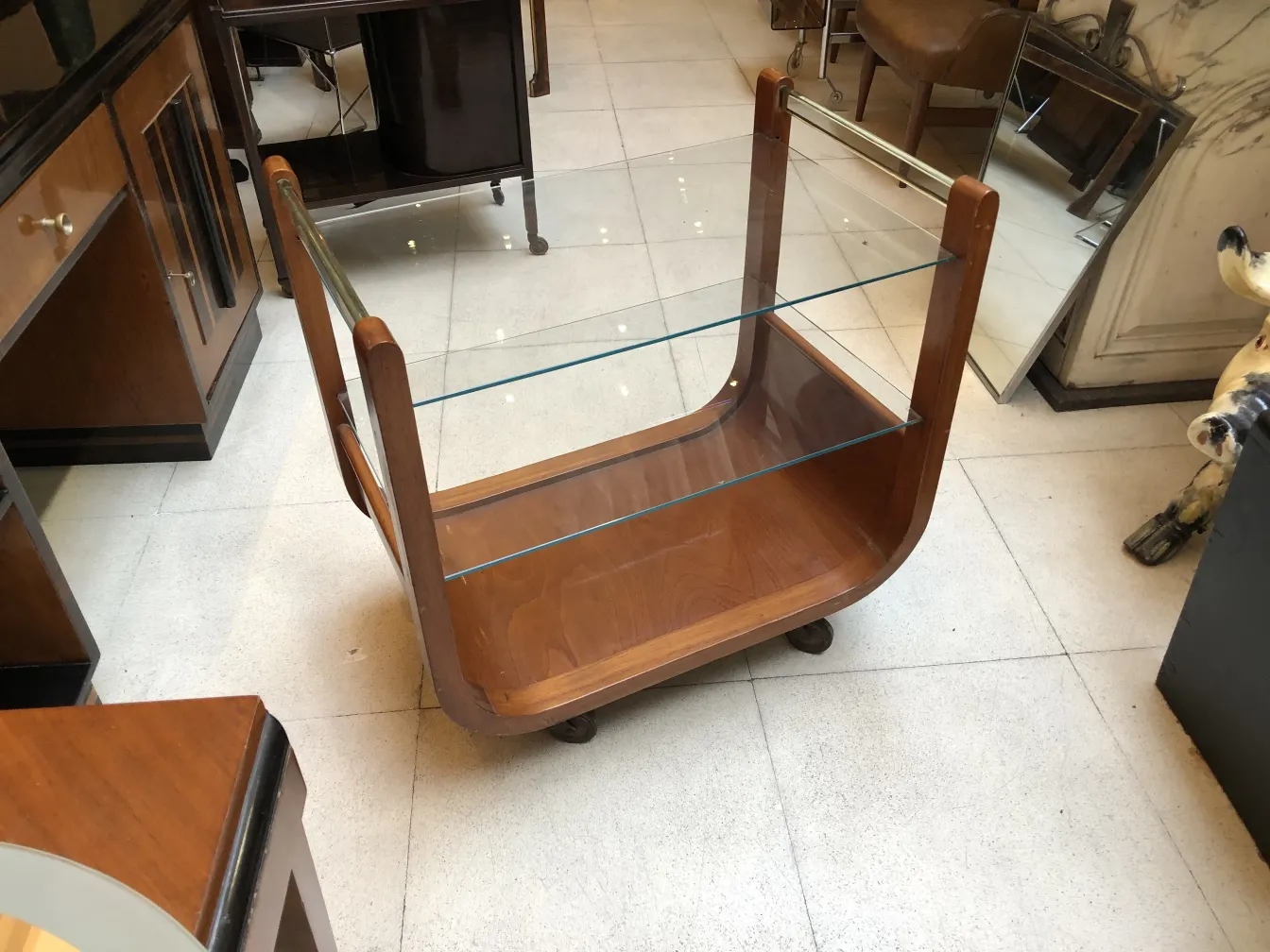 Antique cocktail trolley with wooden frame and glass shelves