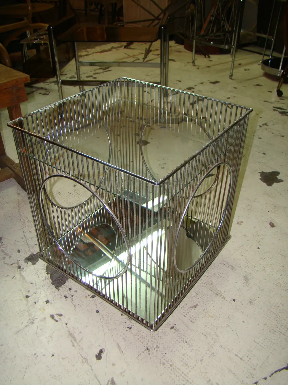 Antique cocktail trolley with a classic design and shiny mirror