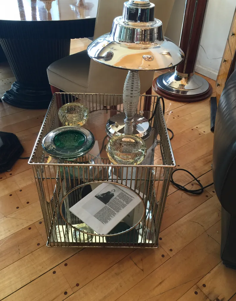 Antique cocktail trolley with a metal frame and elegant decor
