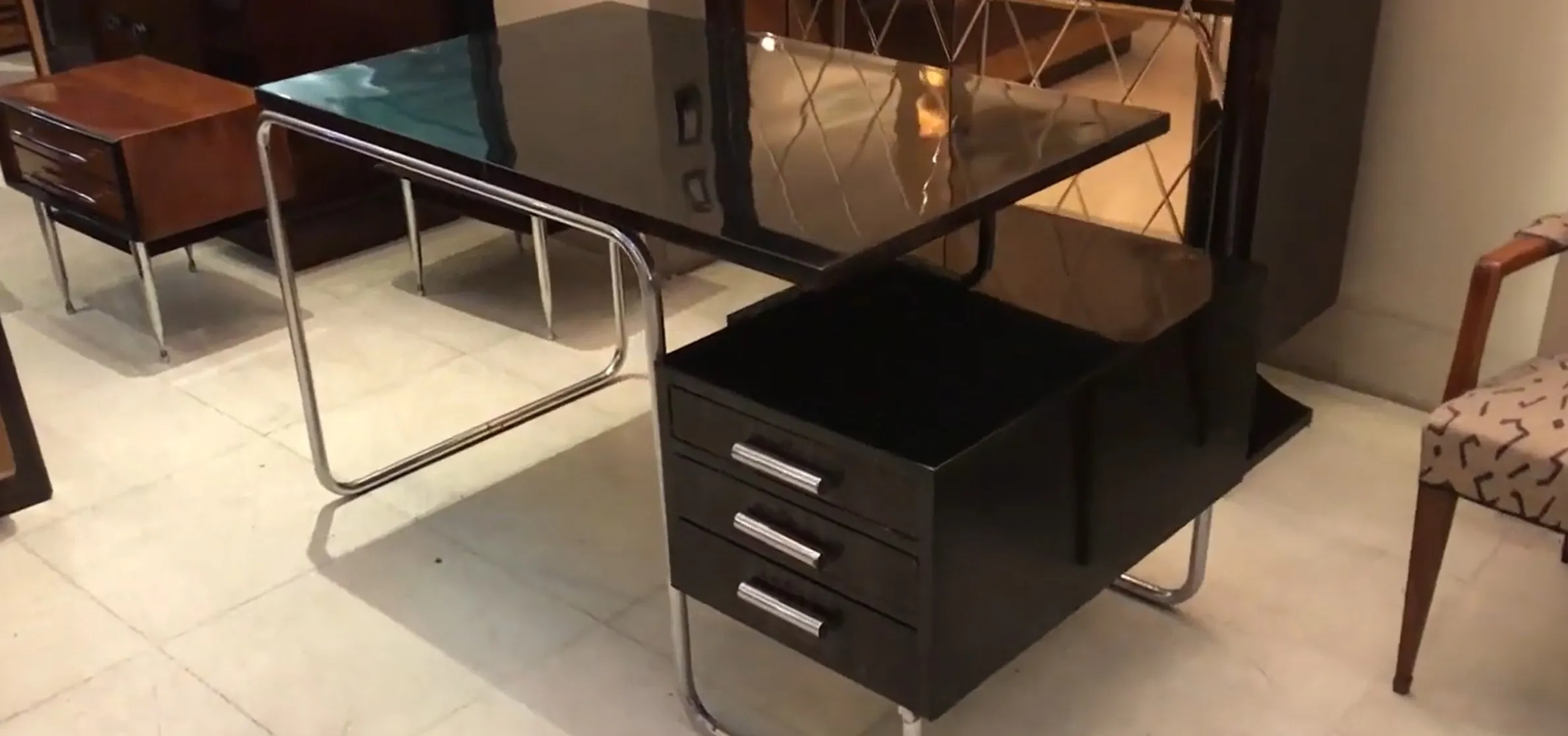 antique desk with contemporary design and drawers