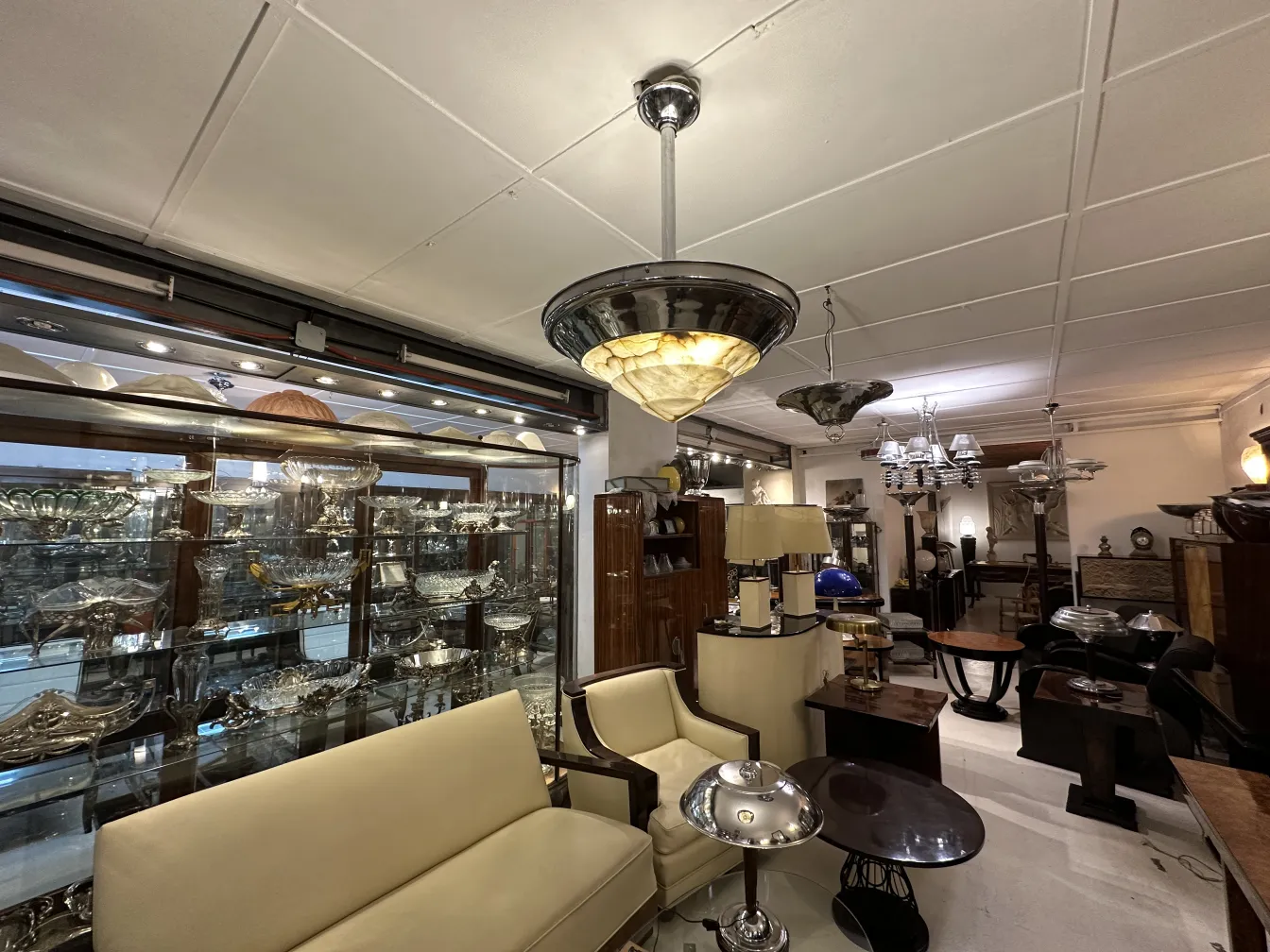 Antique hanging lamp with elegant design and warm light.